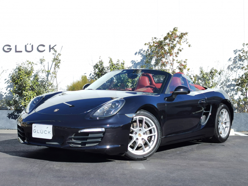 ポルシェ ボクスター(Type981) ボクスター  左ハンドル 6速MT 赤革　 純正ナビ バックカメラ 2Way電動シート レッドソフトトップ 純正18インチA/W 電動格納ドアミラー SPORTモード バイキセノンヘッドライト スポーツシート ブラックキャリパー